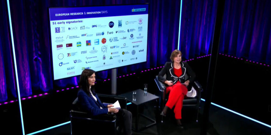 picture of Mariya Gabriel (Commissioner for Innovation, Research, Culture, Education and Youth) and Anna Panagopoulou (Director of European Research Area & Innovation in the European Commission) in front of the logos of the 51 early signatories
